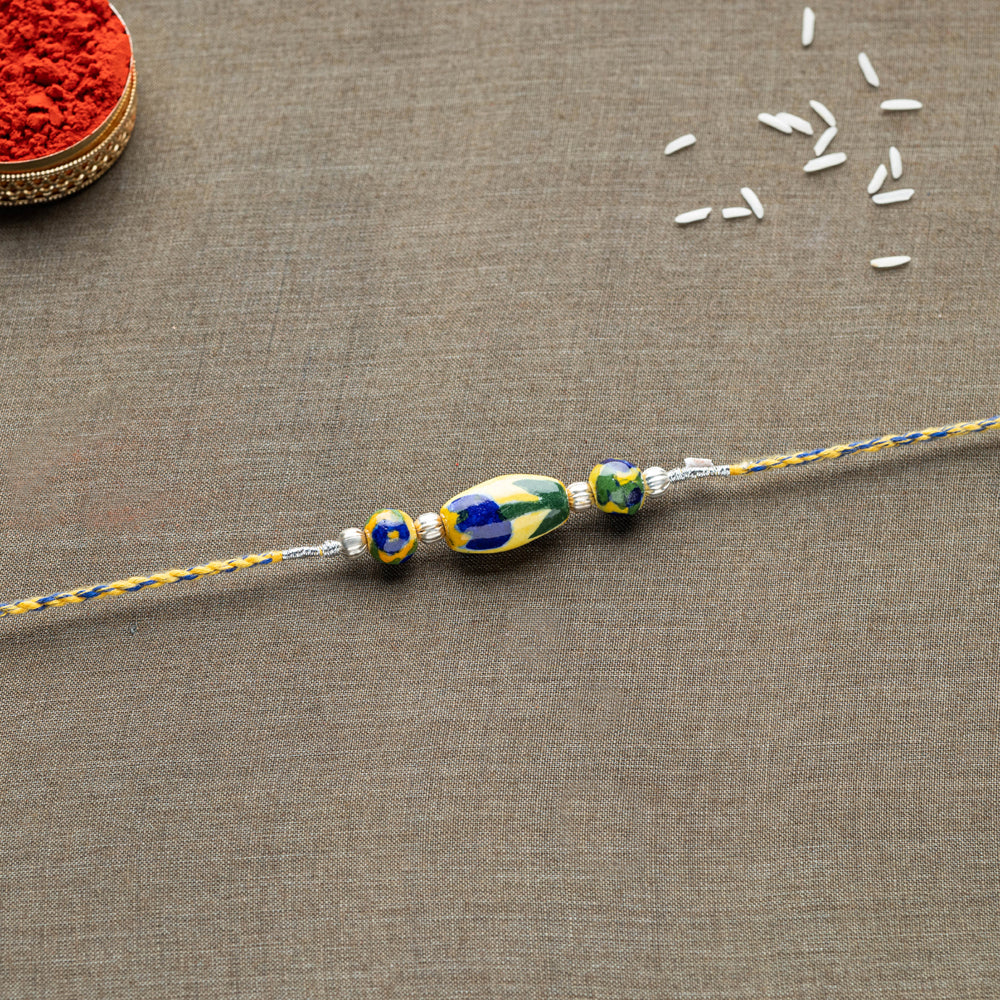 Patwa Threadwork Blue Pottery Beads Rakhi